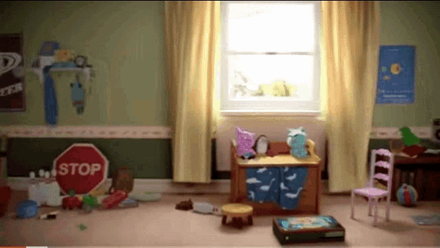 a child 's room with a stop sign in the middle of it
