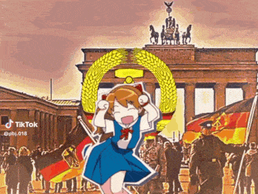 a girl in a blue dress is dancing in front of a crowd of people with german flags .