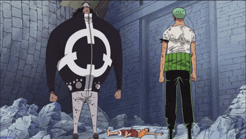 a man in a green shirt is standing next to a man in a black shirt with a white circle on his back