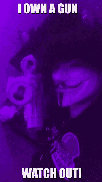 a person holding a gun with the words " i own a gun watch out "