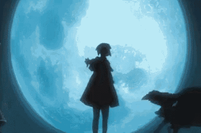 a woman is standing in front of a full moon with a dog .
