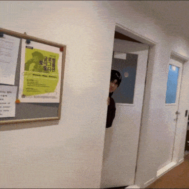 a bulletin board with a yellow poster on it that says youth are heroes