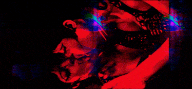 a green background with red and blue lines and a red triangle in the middle