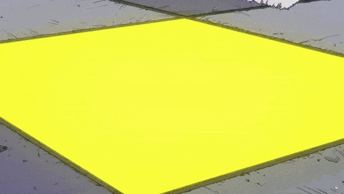 a large yellow explosion is coming from a building