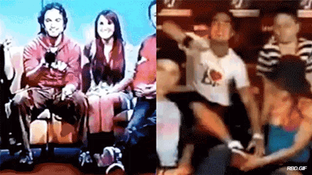 a group of people are sitting next to each other and one of them is wearing a shirt that says ' i love you '