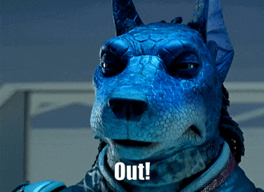 a blue dog with the word out on it