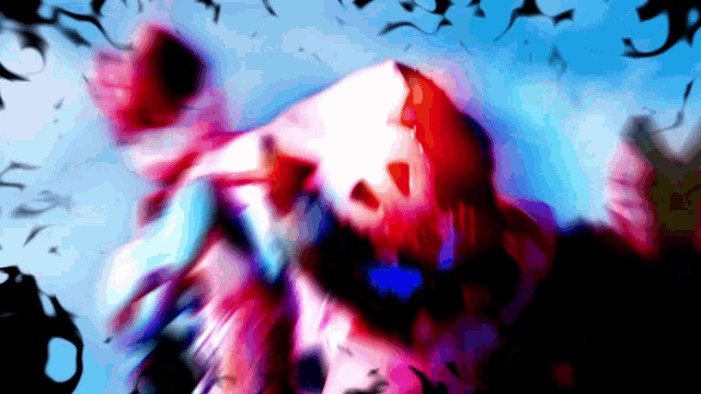 a blurry image of a person 's face with a blue background