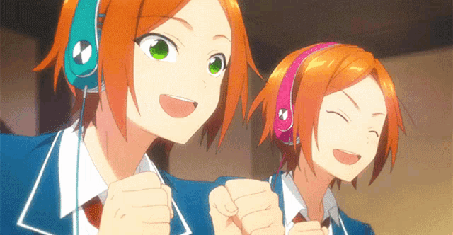 two anime characters are wearing headphones and smiling for the camera