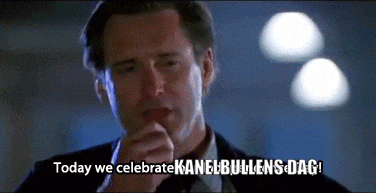 a man in a suit and tie says " today we celebrate kanebulens dag "