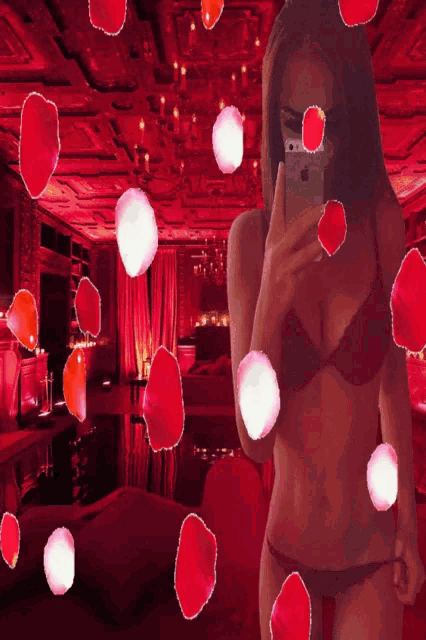 a woman in lingerie is taking a picture of herself with her phone