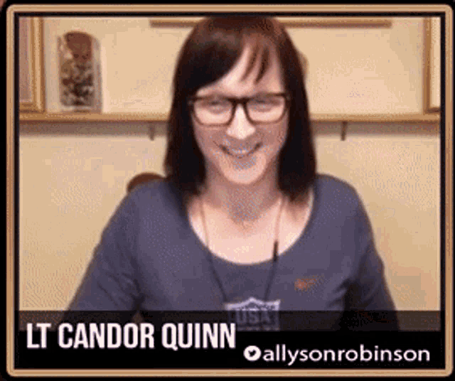 a picture of a woman with the name lt candor quinn on the bottom