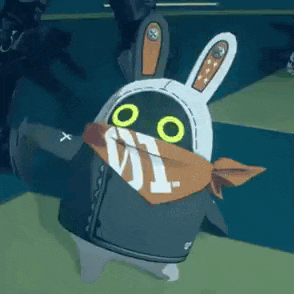 a cartoon character with bunny ears and a scarf around his neck is standing on a blue floor .