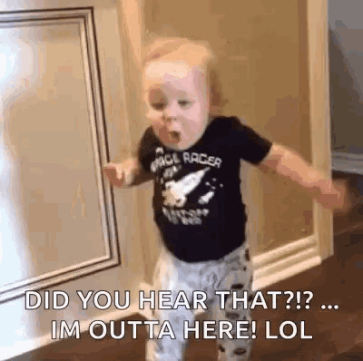 a baby is dancing in a hallway and saying `` did you hear that ? im outta here lol '' .