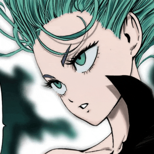 a close up of a girl with green hair