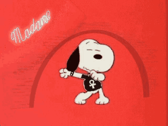 a cartoon of snoopy wearing a black shirt with an ankh symbol on it