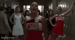 a cheerleader wearing a uniform that says wmhs