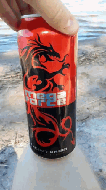 a can of mega force energy drink with a dragon on the front