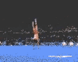 a pixelated image of a fireworks display in the night sky .