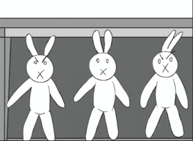 three rabbits are standing next to each other and one has a cross on its face