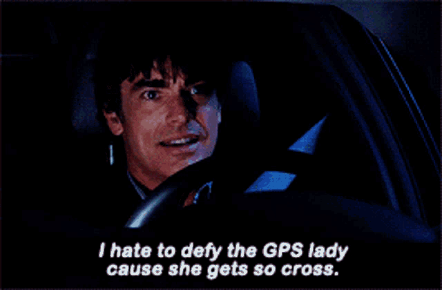 a man driving a car with the words " i hate to defy the gps lady cause she gets so cross "