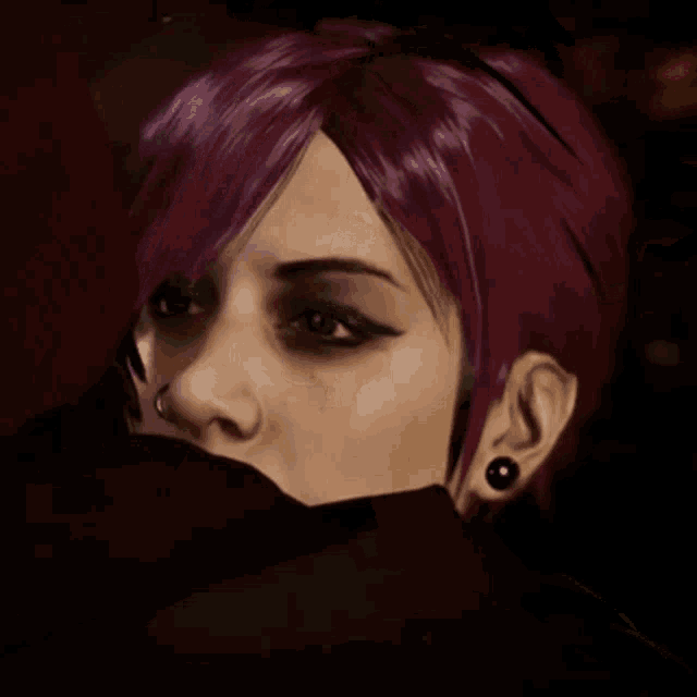 a woman with purple hair and black earrings