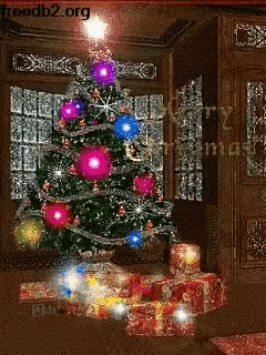 a christmas tree with gifts underneath it and the words merry christmas written on the bottom