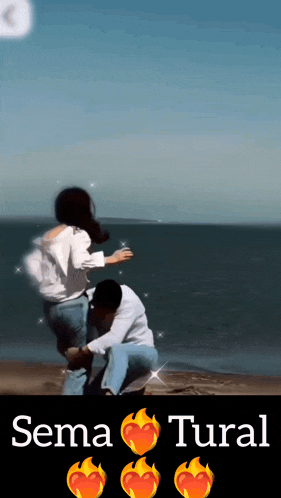 a man kneeling down next to a woman on a beach with the name sema tural