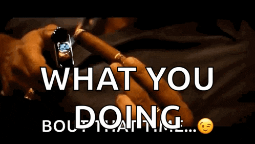 a person holding a cigar with the words " what you doing " written below it