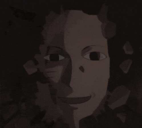 a close up of a man 's face with a shadow on his face