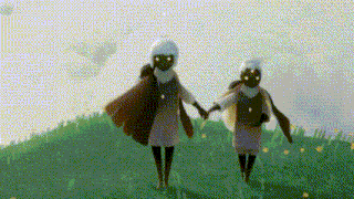 two people are holding hands while walking on top of a grassy hill .