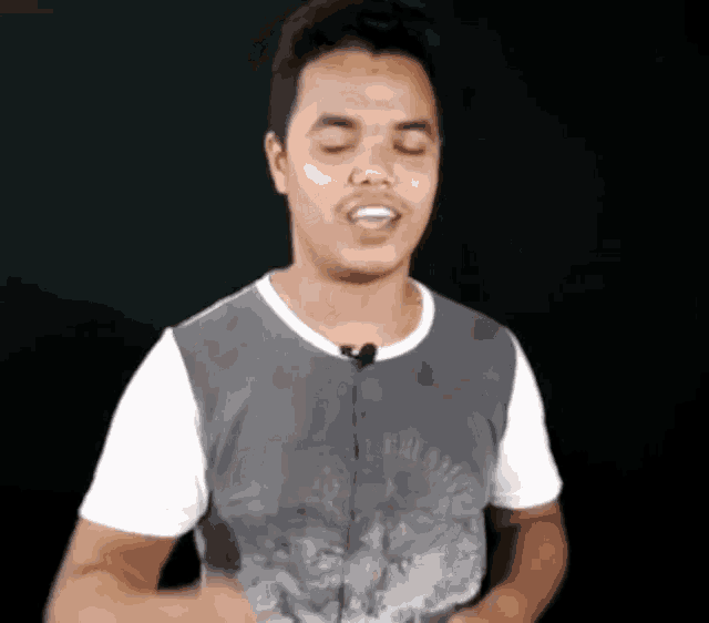 a man wearing a t-shirt that says ' freedom ' on it