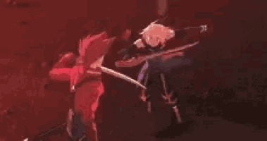 a close up of a person holding a sword in their hand .