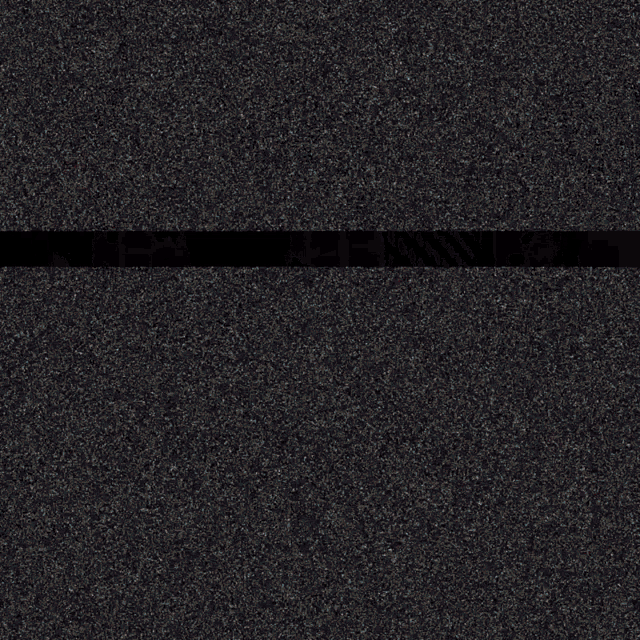a close up of a gray and black striped rug