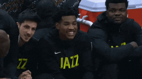 a man wearing a black jacket that says jazz