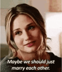 a woman is smiling and talking about marrying each other .
