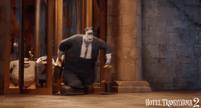 a movie poster for hotel transylvania 2