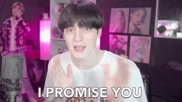 a young man is standing in front of a microphone and says `` i promise you '' .