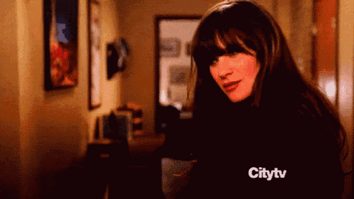 a woman in a hallway with the words citytv on the bottom right