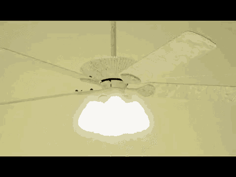 a white ceiling fan with a light on the bottom