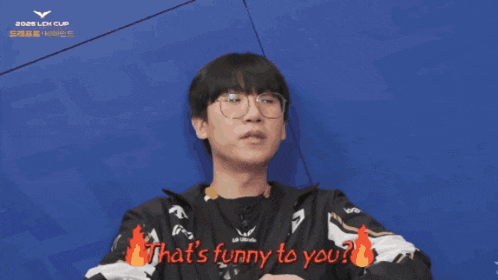 two men are sitting in front of a screen that says lck cup on it