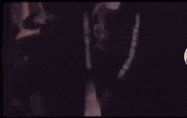 a close up of a person holding another person 's face .