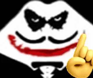 the joker is wearing a tuxedo and giving a thumbs up sign