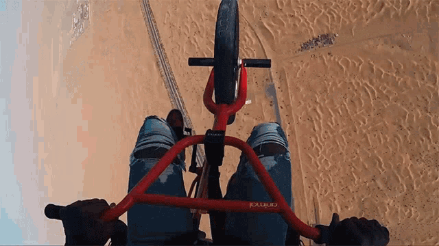 a person riding a bike with a handlebar that says bounce
