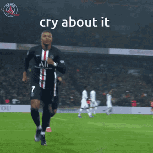 a soccer player with the number 7 on his jersey is running on a field