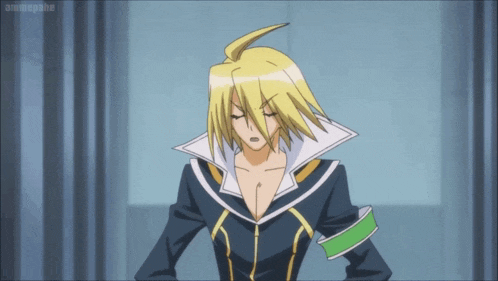 a man with blonde hair and a green armband stands in front of a sign that says animepanie