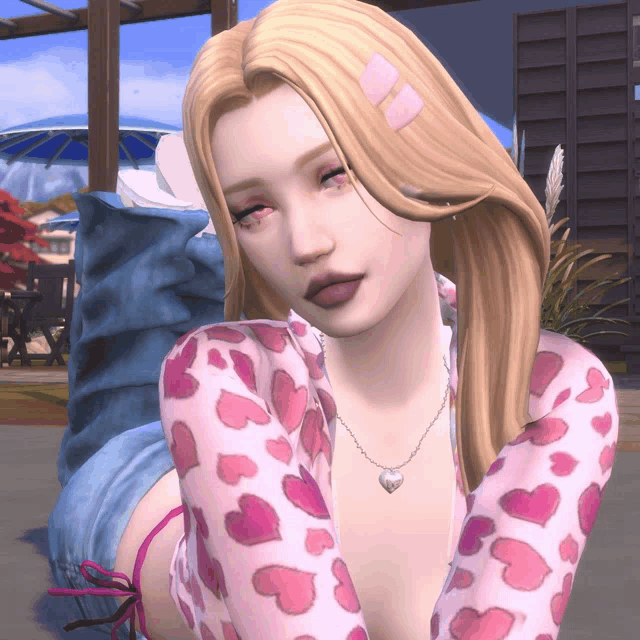 a woman wearing a pink shirt with pink hearts on it