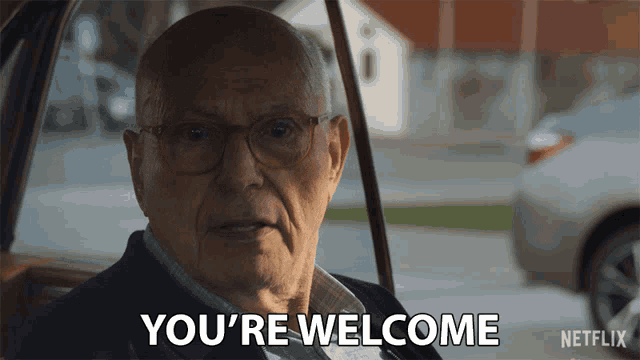 an elderly man in a car says you 're welcome