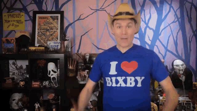 a man wearing a cowboy hat and a shirt that says i love bixby