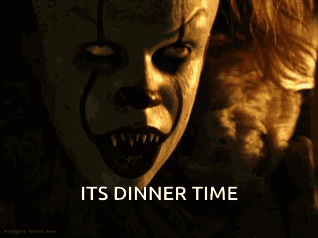 a picture of a scary clown with the words its dinner time below him