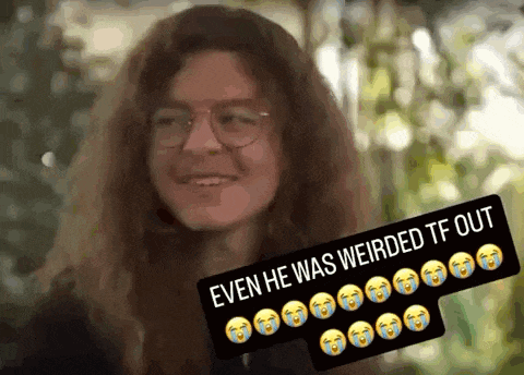 a man with long hair and glasses is smiling with a caption that says `` even he was weirded tf out ''